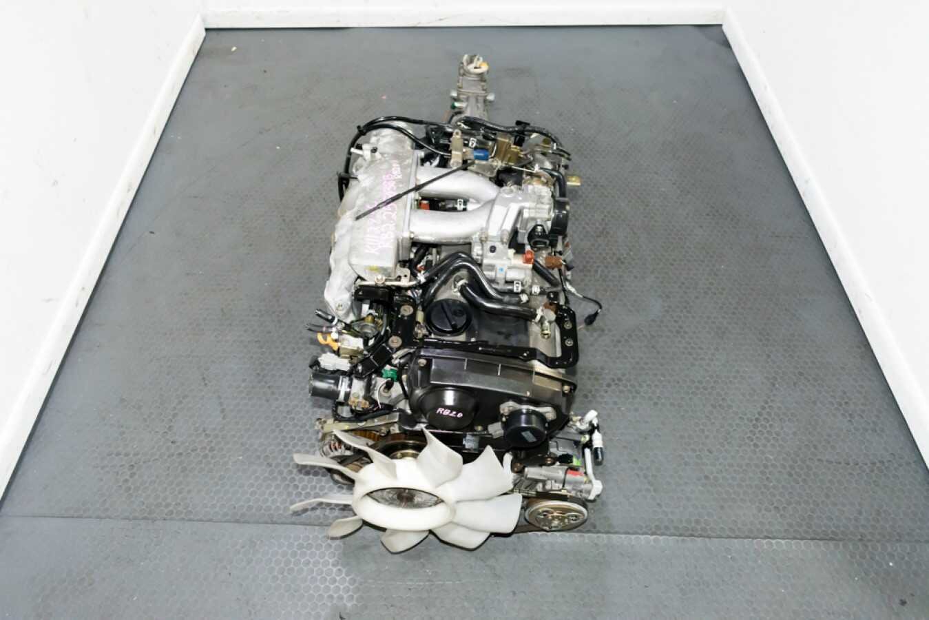 Low Mileage Very Clean Nissan Skyline R34 RB20DE Neo 2.0L DOHC Non Turbo Inline 6 Cylinder Engine with ECU and Wire Harness for sale.
