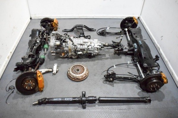 JDM 2003-2008 Forester STi TY856WL7CC Non DCCD Complete Transmission Package with 5×100 Hubs, Brakes, Rear Diff, Subframes, Etc. SG5 SG9